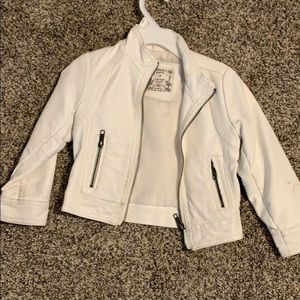 White child’s leather jacket